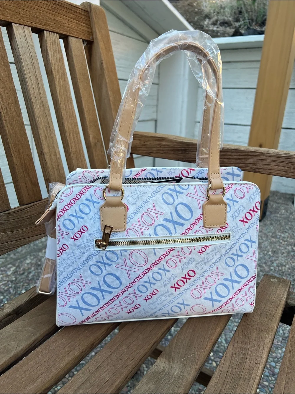 XOXO White Satchel with Blue and Red Logo Print and Tan Trims